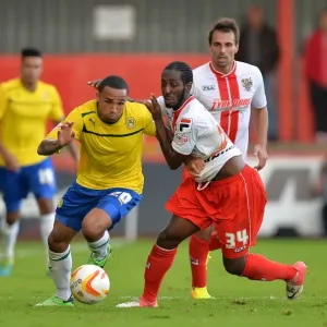 Battle for the Ball: Wilson vs. Deacon in Coventry City's Sky Bet League One Clash with Stevenage Battle for the Ball: Wilson vs. Deacon in Coventry City's Sky Bet League One Clash with Stevenage