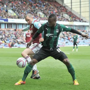 Battle for Possession: Coventry City vs. Burnley, Championship Clash Battle for Possession: Coventry City vs. Burnley, Championship Clash