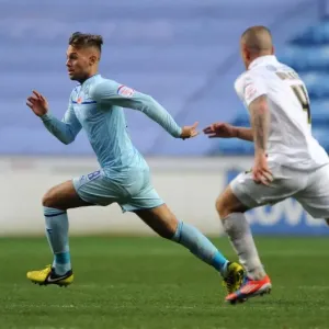 Battling for the Ball: Coventry City vs Scunthorpe United in Football League One at Ricoh Arena Battling for the Ball: Coventry City vs Scunthorpe United in Football League One at Ricoh Arena