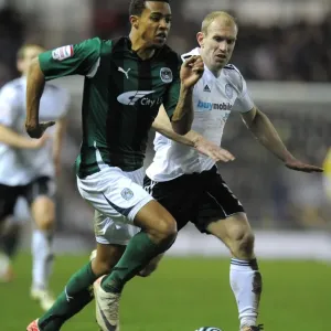 Battling for the Ball: Cyrus Christie vs. Gareth Roberts - Derby County vs. Coventry City, Npower Championship Battling for the Ball: Cyrus Christie vs. Gareth Roberts - Derby County vs. Coventry City, Npower Championship