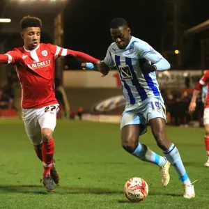 Battling for Control: Holgate vs. Nouble in Sky Bet League One Clash at Oakwell Battling for Control: Holgate vs. Nouble in Sky Bet League One Clash at Oakwell