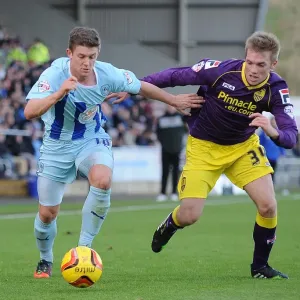 Battling for Control: Phillips vs. Holt in Coventry vs. Notts County League One Clash Battling for Control: Phillips vs. Holt in Coventry vs. Notts County League One Clash