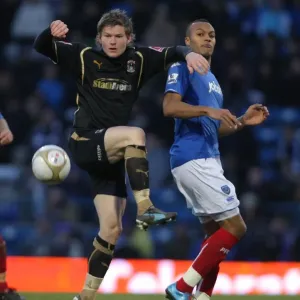 Battling for the FA Cup: Kaboul vs. Gunnarsson at Fratton Park (Portsmouth v Coventry City, 2010) Battling for the FA Cup: Kaboul vs. Gunnarsson at Fratton Park (Portsmouth v Coventry City, 2010)