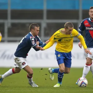 Battling for Supremacy: Chantler vs. Baker in Npower League One Clash Battling for Supremacy: Chantler vs. Baker in Npower League One Clash