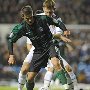 Battling for Supremacy: Jutkiewicz vs. Lees in the Npower Championship Clash between Leeds United and Coventry City
