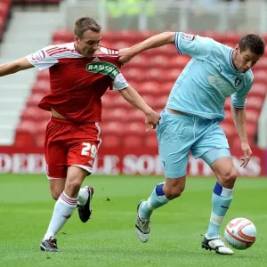 Battling for Supremacy: McMahon vs. Jutkiewicz in the Npower Championship Clash between Middlesbrough and Coventry City Battling for Supremacy: McMahon vs. Jutkiewicz in the Npower Championship Clash between Middlesbrough and Coventry City
