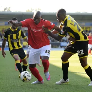 Binnom-Williams vs. Fortune: A Fierce Tackle in Sky Bet League One Clash between Burton Albion and Coventry City Binnom-Williams vs. Fortune: A Fierce Tackle in Sky Bet League One Clash between Burton Albion and Coventry City