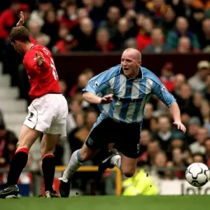 Butt Heads: A Tense Moment Between Nicky Butt and John Hartson in the FA Carling Premiership Clash at Old Trafford (14-04-2001) Butt Heads: A Tense Moment Between Nicky Butt and John Hartson in the FA Carling Premiership Clash at Old Trafford (14-04-2001)