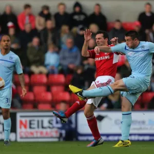 Callum Ball vs. Tommy Miller: A Battle at the County Ground - Intense Goal-line Clash in Swindon Town vs. Coventry City Football Match, Npower League One (October 13, 2012) Callum Ball vs. Tommy Miller: A Battle at the County Ground - Intense Goal-line Clash in Swindon Town vs. Coventry City Football Match, Npower League One (October 13, 2012)