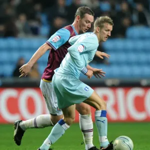 Carl Baker Avoids Glance: Tense Moment between Coventry City's Baker and West Ham's Nolan (Npower Championship, 19-11-2011, Ricoh Arena) Carl Baker Avoids Glance: Tense Moment between Coventry City's Baker and West Ham's Nolan (Npower Championship, 19-11-2011, Ricoh Arena)