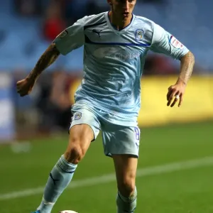 Carl Baker Fights for Coventry City in Intense Capital One Cup Clash vs. Birmingham City at Ricoh Arena Carl Baker Fights for Coventry City in Intense Capital One Cup Clash vs. Birmingham City at Ricoh Arena