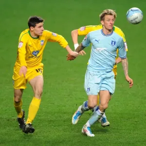 Carl Baker Tackles Owen Garvan and Dean Moxey: Intense Moment from Coventry City vs Crystal Palace, Npower Championship (06-03-2012, Ricoh Arena)