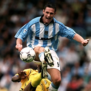 Cedric Roussel vs. Lucas Radebe: A Battle in the FA Carling Premiership - Coventry City vs. Leeds United (September 9, 2000)