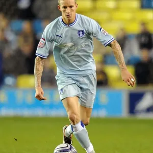 Championship Showdown at The Den: Coventry City vs Millwall - Carl Baker in Action Championship Showdown at The Den: Coventry City vs Millwall - Carl Baker in Action