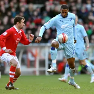 Clash at the City Ground: Platt and Higginbotham's Intense Battle for Ball Supremacy (18-02-2012) - Coventry City vs. Nottingham Forest, Npower Championship Clash at the City Ground: Platt and Higginbotham's Intense Battle for Ball Supremacy (18-02-2012) - Coventry City vs. Nottingham Forest, Npower Championship