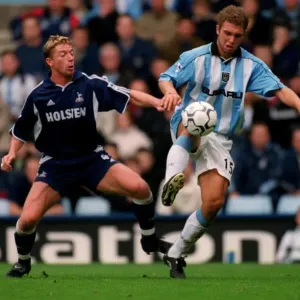Clash at the Coventry: Eustace vs. Freund in FA Carling Premiership Showdown (Coventry City vs. Tottenham Hotspur, 14-10-2000) Clash at the Coventry: Eustace vs. Freund in FA Carling Premiership Showdown (Coventry City vs. Tottenham Hotspur, 14-10-2000)