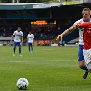 Clash at Gigg Lane: A Battle of Titans - Armstrong vs. Clarke in Sky Bet League One