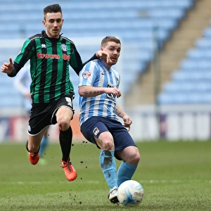 Clash of Midfield Titans: John Fleck vs Matty Lund in Sky Bet League One at the Ricoh Arena