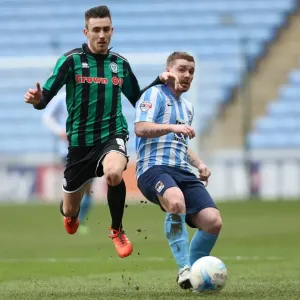Clash of Midfield Titans: John Fleck vs Matty Lund in Sky Bet League One at the Ricoh Arena