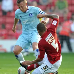 Clash at Oakwell: Sammy Clingan vs. Nathan Doyle, Coventry City vs. Barnsley, Football League Championship Clash at Oakwell: Sammy Clingan vs. Nathan Doyle, Coventry City vs. Barnsley, Football League Championship