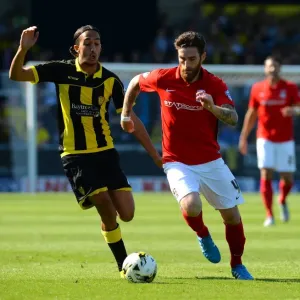 Clash at Pirelli Stadium: A Battle Between Nasser El Khayati and Romain Vincelot in Sky Bet League One Clash at Pirelli Stadium: A Battle Between Nasser El Khayati and Romain Vincelot in Sky Bet League One
