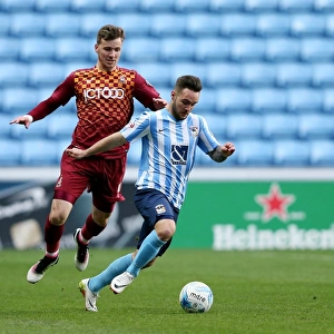 Clash at Ricoh Arena: Coventry City vs. Bradford City - Intense Moment between Adam Armstrong and Lee Evans