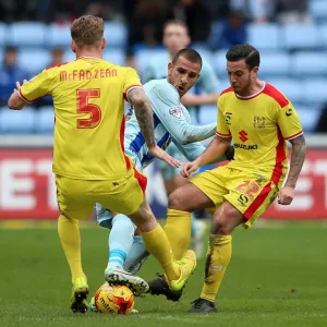 Clash at Ricoh Arena: Coventry City vs Milton Keynes Dons - Sky Bet League One: Intense Moment between Marcus Tudgay and Milton Keynes Dons Kyle McFadzean and Samir Carruthers Clash at Ricoh Arena: Coventry City vs Milton Keynes Dons - Sky Bet League One: Intense Moment between Marcus Tudgay and Milton Keynes Dons Kyle McFadzean and Samir Carruthers