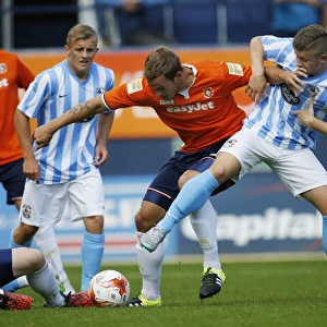 Clash of Titans: Luke Wilkinson vs. Aaron Phillips in Coventry City's Pre-Season Friendly at Luton Town