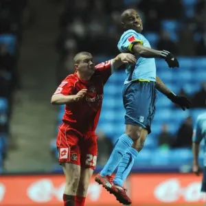 Clinton Morrison vs. Carl Dickinson: Intense Battle in Coventry City vs. Barnsley Championship Clash (09-01-2010)