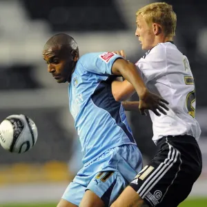 Clinton Morrison vs. Dean Moxey: A Battle in the Championship - Coventry City vs. Derby County at Pride Park Clinton Morrison vs. Dean Moxey: A Battle in the Championship - Coventry City vs. Derby County at Pride Park