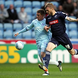 Cody McDonald vs Darren Ward: Intense Tackle in Coventry City vs Millwall Npower Championship Match (17-04-2012)