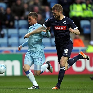 Cody McDonald vs Darren Ward: A Tight Tussle in Coventry City vs Millwall Npower Championship Match
