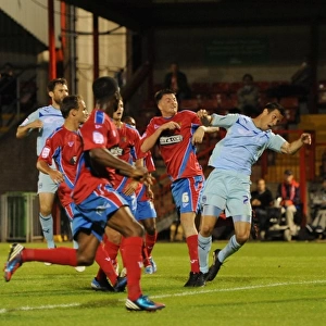 Controversial Penalty and Dramatic Shootout: Coventry City's Victory over Dagenham and Redbridge in the Capital One Cup