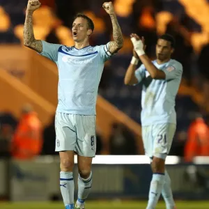Coventry City FC: Celebrating Promotion - Baker and Christie's Triumphant Moment after Winning against Colchester United in Npower League One Coventry City FC: Celebrating Promotion - Baker and Christie's Triumphant Moment after Winning against Colchester United in Npower League One
