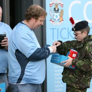 Coventry City FC vs Reading in the Championship: Fans Honor Remembrance Day with Poppies at Ricoh Arena Coventry City FC vs Reading in the Championship: Fans Honor Remembrance Day with Poppies at Ricoh Arena