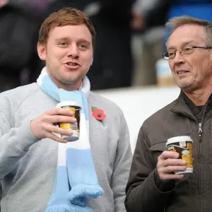 Coventry City Football Club: A Cozy Npower Championship Moment - Fans Savoring Hot Drinks at Ricoh Arena Coventry City Football Club: A Cozy Npower Championship Moment - Fans Savoring Hot Drinks at Ricoh Arena