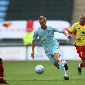 Coventry City vs. Watford: Carl Baker Tackles Watford's Defense in Npower Championship Match (20-08-2011, Ricoh Arena) Coventry City vs. Watford: Carl Baker Tackles Watford's Defense in Npower Championship Match (20-08-2011, Ricoh Arena)