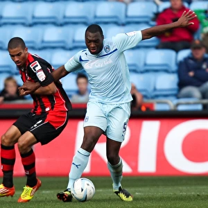 Coventry City vs Bournemouth: Nathan Cameron vs Lewis Grabban - Intense Battle in Npower League One at Ricoh Arena