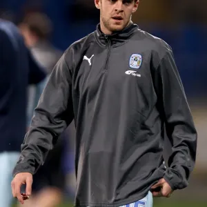 Coventry City vs Cardiff City: Npower Championship Showdown at Cardiff City Stadium (21-03-2012) - Martin Cranie Focus