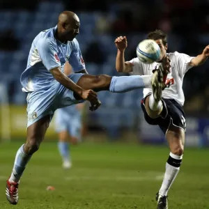 Coventry City vs Ipswich Town: Dele Adebola Battles for the Ball in Coca-Cola Championship Match at The Ricoh Arena (2007) Coventry City vs Ipswich Town: Dele Adebola Battles for the Ball in Coca-Cola Championship Match at The Ricoh Arena (2007)