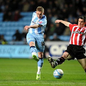 Coventry City vs Sheffield United: Freddy Eastwood's Thrilling Shot in Championship Action at Ricoh Arena (04-03-2009)