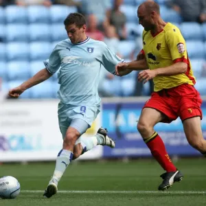 Coventry City vs. Watford: Clash between Lukas Jutkiewicz and Martin Taylor in the Npower Championship (20-08-2011, Ricoh Arena) Coventry City vs. Watford: Clash between Lukas Jutkiewicz and Martin Taylor in the Npower Championship (20-08-2011, Ricoh Arena)