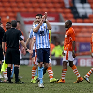 Coventry City's Aaron Martin Celebrates League One Victory with Fans at Blackpool