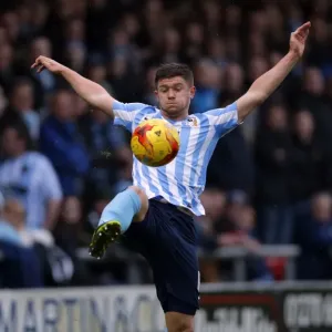 Coventry Citys Aaron Phillips in action