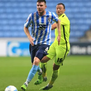 Coventry Citys Chris Stokes (left) and Southend Uniteds Noel Hunt battle for the ball Coventry Citys Chris Stokes (left) and Southend Uniteds Noel Hunt battle for the ball