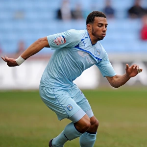 Coventry City's Cyrus Christie in Action Against Doncaster Rovers at Ricoh Arena