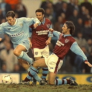 Coventry City's Eion Jess Pulls Away from West Ham United's Ian Bishop