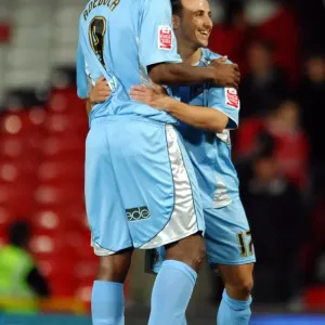 Coventry City's Historic Double Victory: Dele Adebola and Michael Mifsud Celebrate Upset Over Manchester United in Carling Cup (September 26, 2007) Coventry City's Historic Double Victory: Dele Adebola and Michael Mifsud Celebrate Upset Over Manchester United in Carling Cup (September 26, 2007)