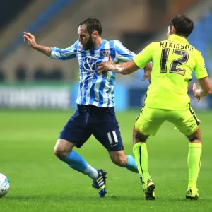 Coventry Citys Jim O Brien (left) and Southend Uniteds Will Atkinson battle for the ball Coventry Citys Jim O Brien (left) and Southend Uniteds Will Atkinson battle for the ball