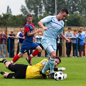 Coventry City's Roy O'Donovan Outsmarts Hinckley United's Goalkeeper during Pre-Season Friendly